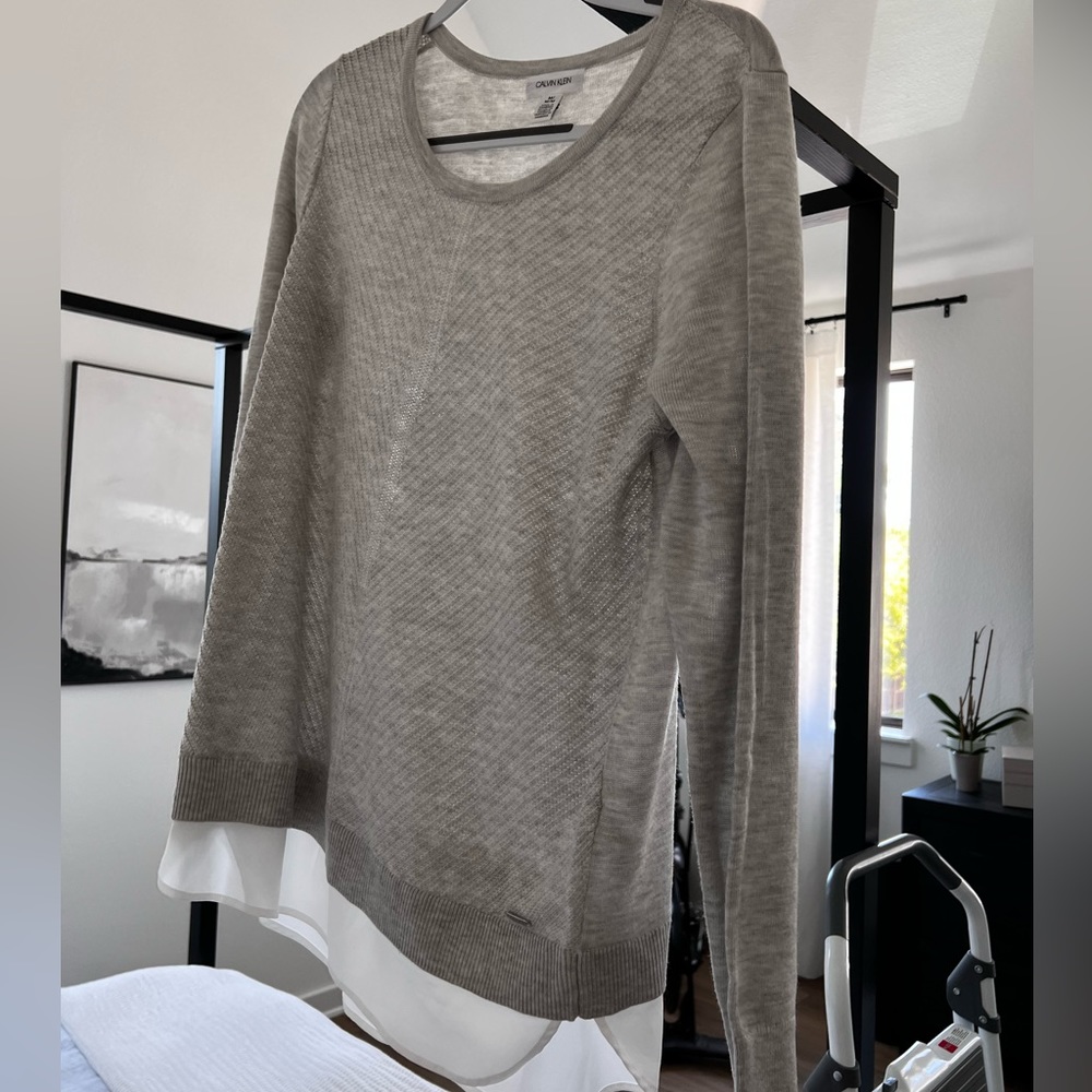 Sweater with sewn in blouse